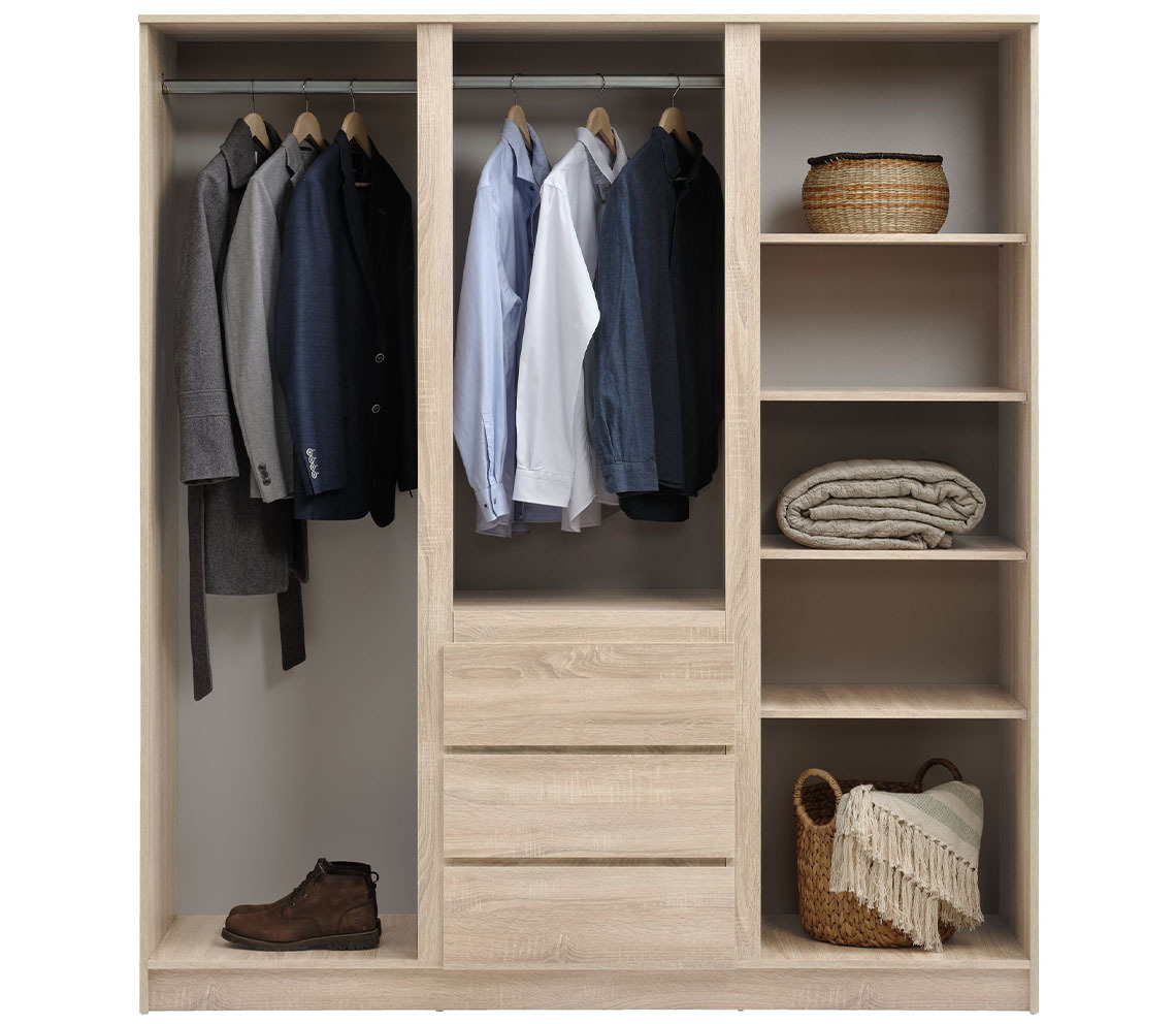 Wardrobe interior with space for wardrobe inserts such as boxes and baskets