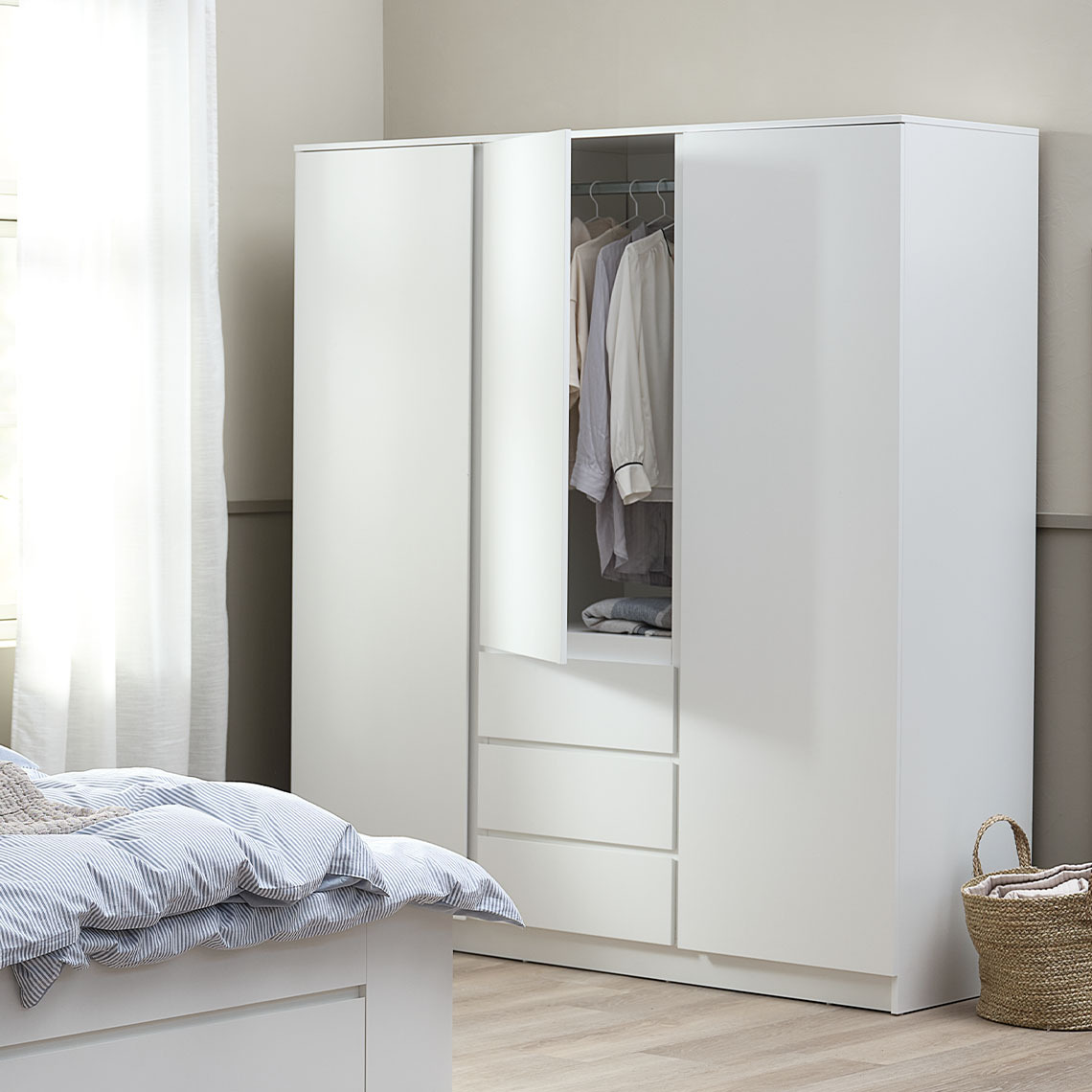 White wardrobe with 3 hinged doors and drawers